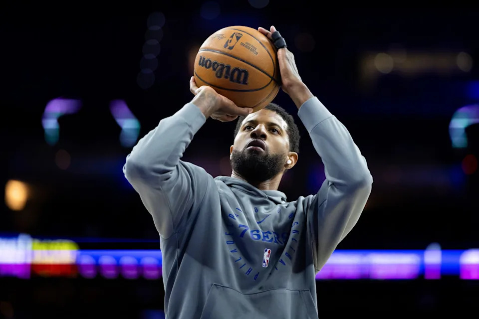 Philadelphia 76ers forward Paul George warms up before a game against the Boston Celtics at Wells Fargo Center.Bill Streicher-Imagn Images
