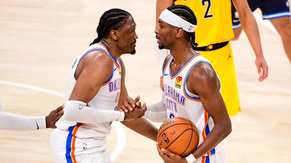 OKLAHOMA CITY, OK - JUNE 16: Jalen Williams #8 and Shai Gilgeous-Alexander #2 of the Oklahoma City Thunder high five during the game against the Indiana Pacers during Game Five of the 2025 NBA Finals on June 16, 2025 at Paycom Center in Oklahoma City, Oklahoma. NOTE TO USER: User expressly acknowledges and agrees that, by downloading and or using this photograph, User is consenting to the terms and conditions of the Getty Images License Agreement. Mandatory Copyright Notice: Copyright 2025 NBAE (Photo by Adam Pantozzi/NBAE via Getty Images)