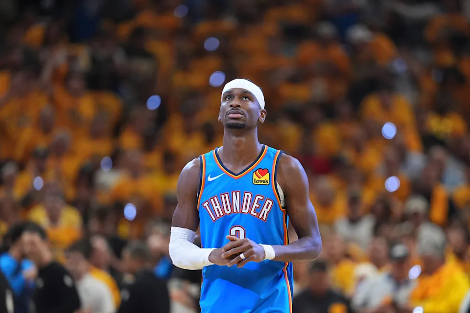 Oklahoma City Thunder guard Shai Gilgeous-Alexander takes the court during the first half of Game 3 of the NBA Finals basketball series against the Indiana Pacers, Wednesday, June 11, 2025, in Indianapolis. (AP Photo/Michael Conroy)