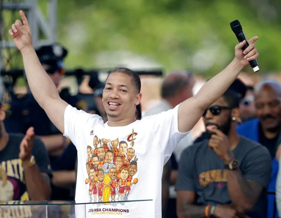 Cleveland Cavaliers head coach Tyronn Lue acknowledges the crowd as he speaks at a rally, Wednesday, June 22, 2016, in Cleveland. The Cavaliers made history by overcoming a 3-1 deficit to beat the Golden State Warriors in the NBA Finals and end the city’s 52-year drought without a professional sports championship. (AP Photo/Tony Dejak)