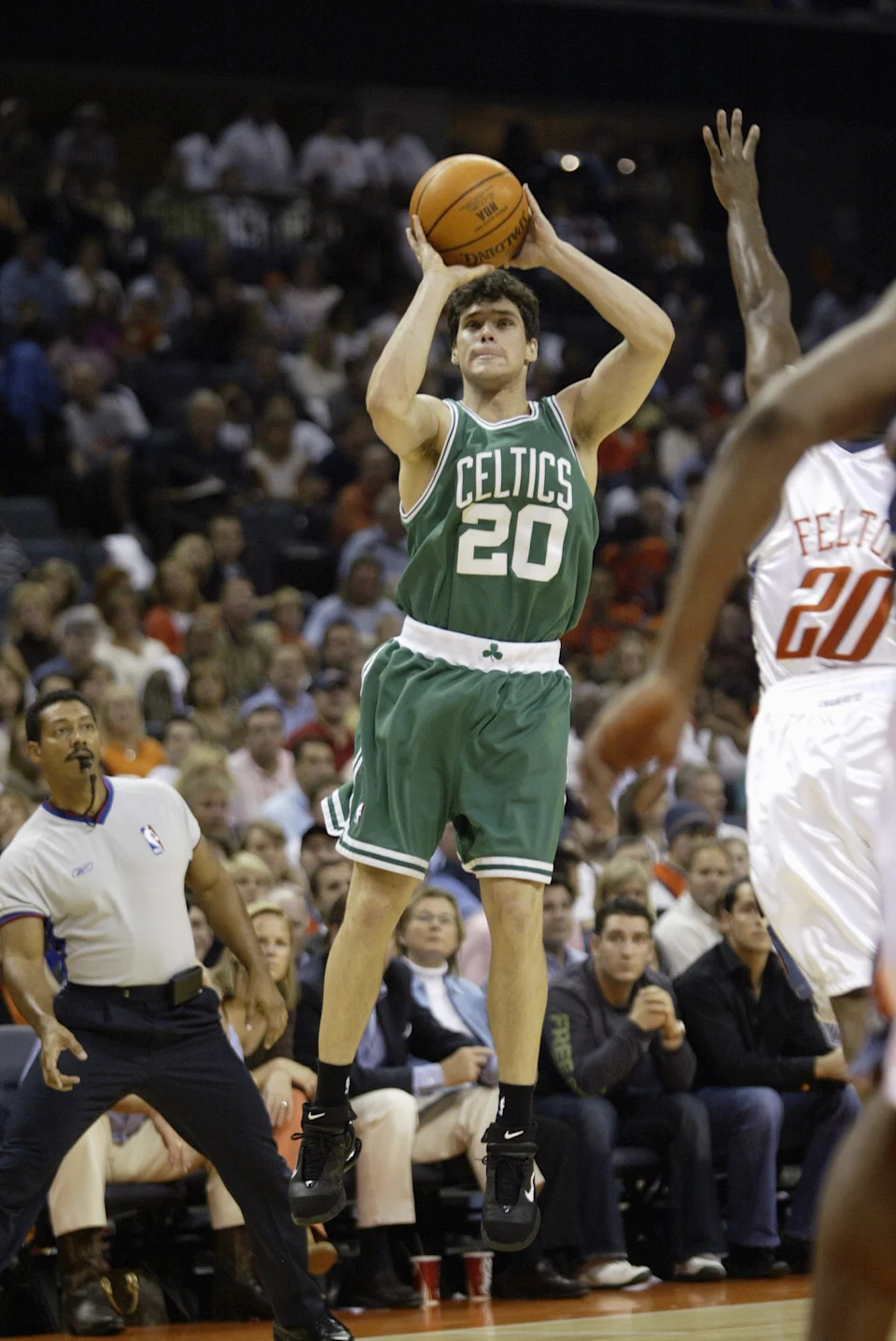 CHARLOTTE, NC - NOVEMBER 5: Dan Dickau #20 of the Boston Celtics shoos a jump shot during a game against the Charlotte Bobcats on opening night at the Charlotte Coliseum on November 5, 2005 in Charlotte, North Carolina. The Bobcats won 107-105. (Photo by Craig Jones/Getty Images)
