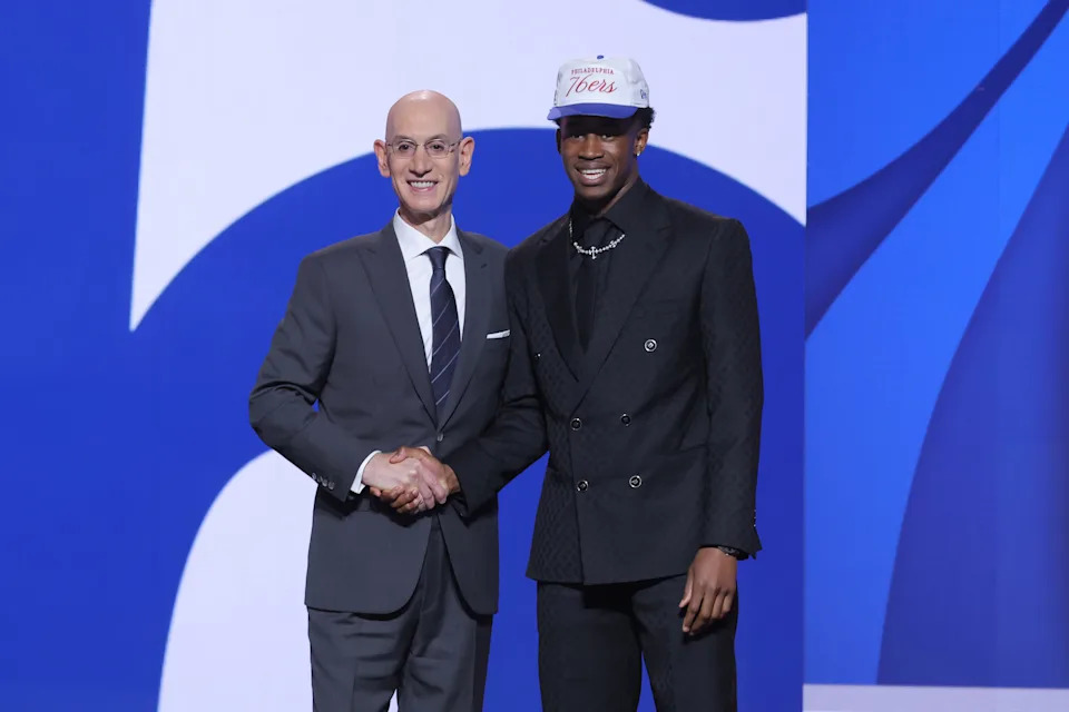 Jun 25, 2025; Brooklyn, NY, USA; VJ Edgecombe stands with NBA commissioner Adam Silver after being selected as the third pick by the Philadelphia 76ers in the first round of the 2025 NBA Draft at Barclays Center. Mandatory Credit: Brad Penner-Imagn Images