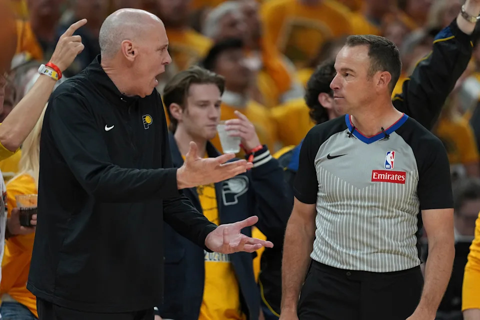 Indiana Pacers head coach Rick Carlisle argues with referee Josh Tiven during the second half of Game 4 of the NBA Finals basketball series against the Oklahoma City Thunder, Friday, June 13, 2025, in Indianapolis. (AP Photo/Michael Conroy)