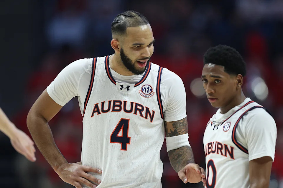 OXFORD, MISSISSIPPI - FEBRUARY 01: Johni Broome #4 of the Auburn Tigers talks with Tahaad Pettiford #0 of the Auburn Tigers during the first half against the Mississippi Rebels at The Pavilion at Ole Miss on February 01, 2025 in Oxford, Mississippi. (Photo by Justin Ford/Getty Images)