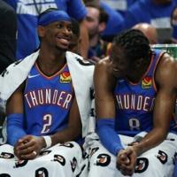 Shai Gilgeous-Alexander and Jalen Williams of the Oklahoma City Thunder react during game five of the NBA Western Conference finals against the Minnesota Timberwolves | News
