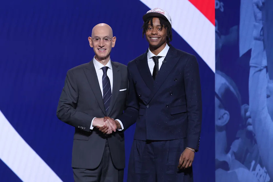 Jun 25, 2025; Brooklyn, NY, USA; Tre Johnson stands with NBA commissioner Adam Silver after being selected as the sixth pick by the Washington Wizards in the first round of the 2025 NBA Draft at Barclays Center. Mandatory Credit: Brad Penner-Imagn Images
