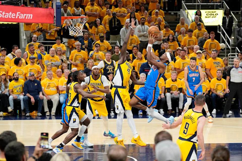 Shai Gilgeous-Alexander attempts a shot during the Thunder’s Game 4 win against the Pacers. Imagn Images