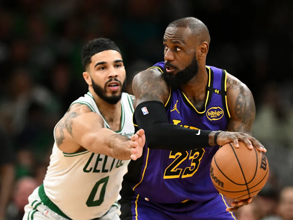 Los Angeles Lakers forward LeBron James (23) and Boston Celtics forward Jayson Tatum (0)© Brian Fluharty-Imagn Images