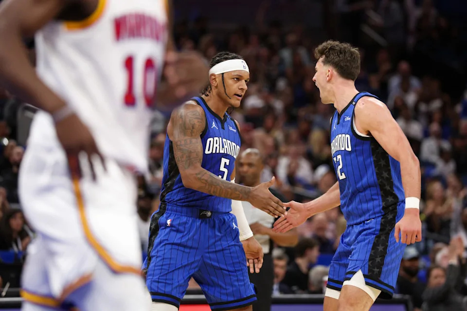 Orlando Magic forward Paolo Banchero and forward Franz Wagner celebrate.Nathan Ray Seebeck-Imagn Images