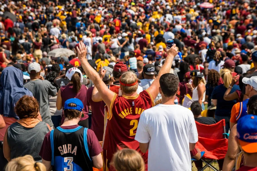 CLEVELAND, OH – JUNE 22: Cleveland fans celebrate during the Cleveland Cavaliers 2016 NBA Championship victory parade and rally on June 22, 2016 in Cleveland, Ohio. The Cavaliers defeated the Golden State Warriors to bring the first professional sports championship to the city of Cleveland since 1964. (Photo by Angelo Merendino/Getty Images)