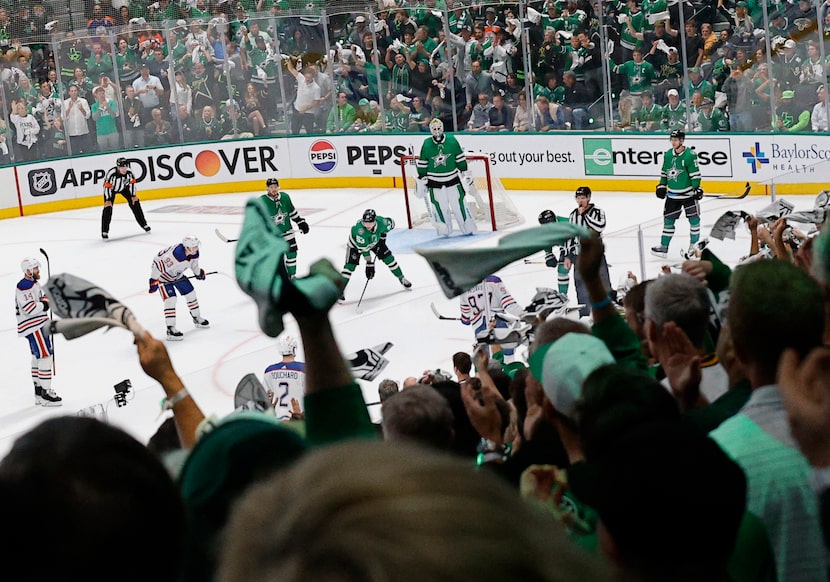 Fans cheer in the third period during Game 1 of the NHL Stanley Cup Playoffs Western...