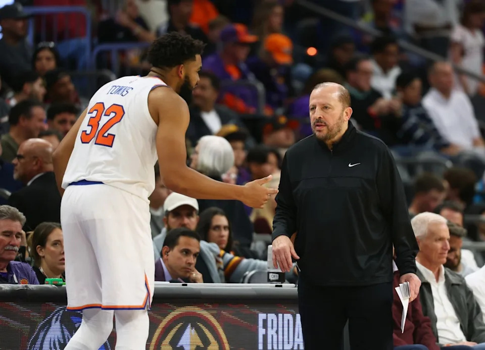 New York Knicks head coach Tom Thibodeau with center Karl-Anthony Towns (32) against the Phoenix Suns at Footprint Center.© Mark J. Rebilas-Imagn Images