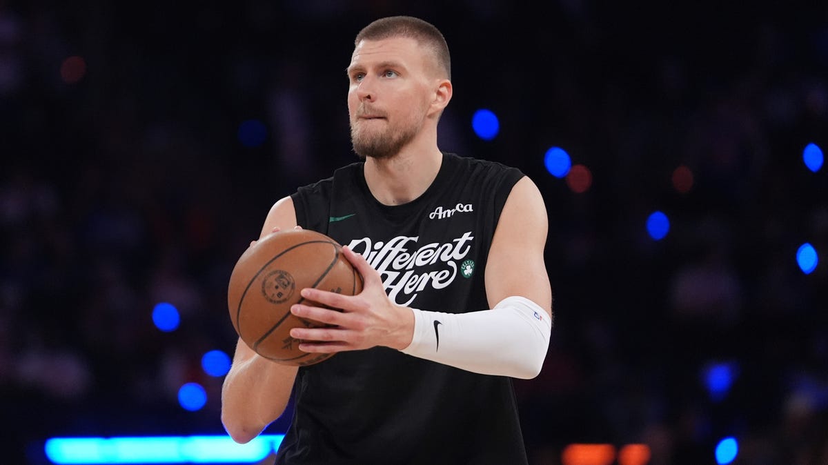Porzingis going to Hawks in three-team trade; Irving gets new deal