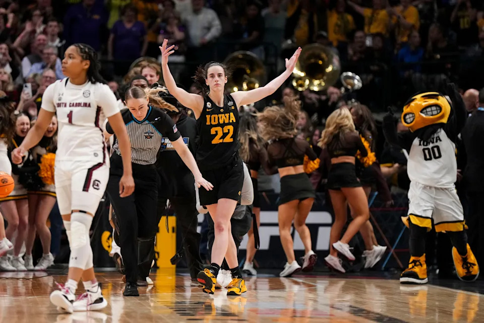 Mar 31, 2023; Dallas, TX, USA; Iowa Hawkeyes guard Caitlin Clark (22) celebrates after defeating the South Carolina Gamecocks in semifinals of the women's Final Four of the 2023 NCAA Tournament at American Airlines Center. Mandatory Credit: Kirby Lee-USA TODAY Sports