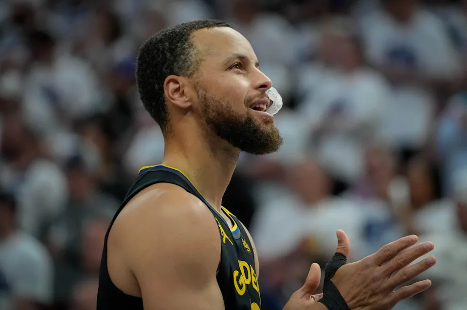 Golden State Warriors guard Stephen Curry (30) prepares to play the Minnesota Timberwolves before game one of the second round for the 2025 NBA Playoffs at Target Center. Bruce Kluckhohn-Imagn Images