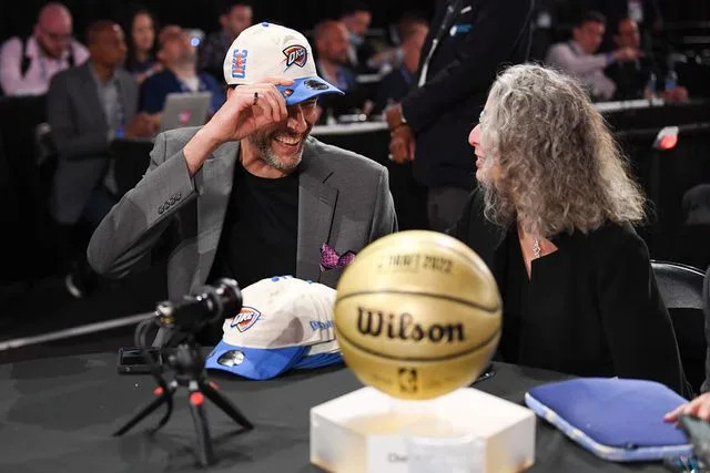 Mike Lawrence/NBAE via Getty David Holmgren and his mom Sarah Harris at the 2022 NBA Draft at Barclays Center in Brooklyn, New York.