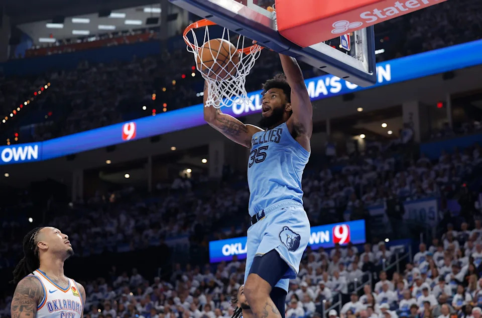 Apr 20, 2025; Oklahoma City, Oklahoma, USA; Memphis Grizzlies forward Marvin Bagley III (35) dunks as Oklahoma City Thunder forward Jaylin Williams (6) looks on during the second half at Paycom Center. Mandatory Credit: Alonzo Adams-Imagn Images