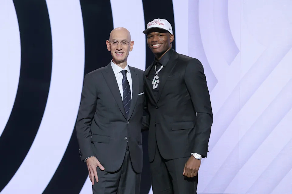 Jun 25, 2025; Brooklyn, NY, USA; Cedric Coward stands with NBA commissioner Adam Silver after being selected as the 11th pick by the Portland Trail Blazers in the first round of the 2025 NBA Draft at Barclays Center. Mandatory Credit: Brad Penner-Imagn Images