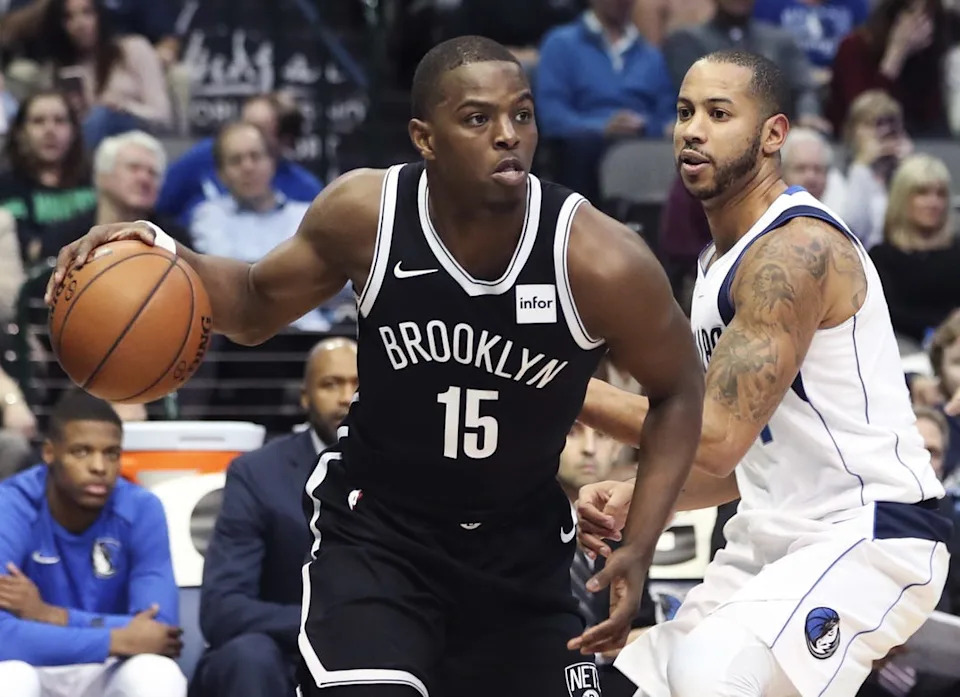 Nov 29, 2017; Dallas, TX, USA; Brooklyn Nets guard Isaiah Whitehead (15) dribbles as Dallas Mavericks guard Devin Harris (34) defends during the second quarter at American Airlines Center. Mandatory Credit: Kevin Jairaj-USA TODAY Sports