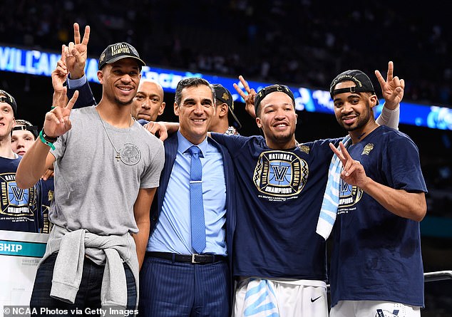 Josh Hart (far left), Jay Wright (center left) and Jalen Brunson (center right) celebrate