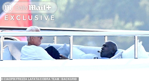 Jordan settled in quickly enough, puffing on a cigar with his father-in-law, Carlos Sr