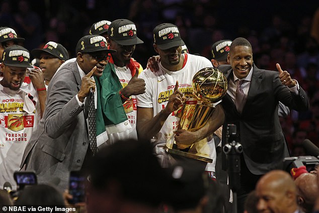 Ujiri is seen celebrating the Raptors beating the Warriors in the 2019 NBA Finals