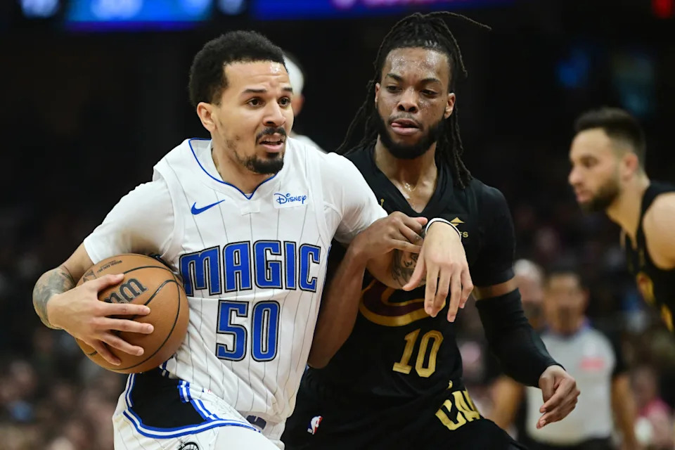 Orlando Magic guard Cole Anthony drives to the basket against Cleveland Cavaliers guard Darius Garland.Ken Blaze-Imagn Images
