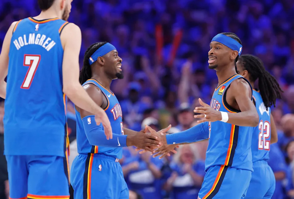 Oklahoma City Thunder guard Shai Gilgeous-Alexander (2), guard Luguentz Dort (5) and forward Chet Holmgren (7) celebrate after a play.© Alonzo Adams-Imagn Images