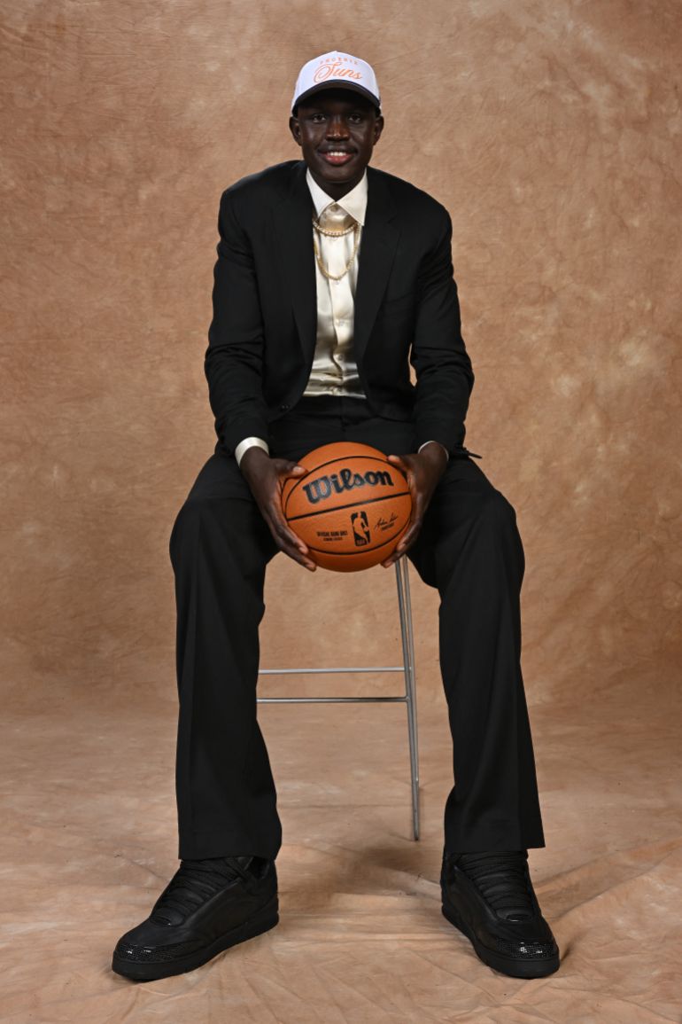 BROOKLYN, NY - JUNE 25: Khaman Maluach poses for a photo after being drafted by the Phoenix Suns during the 2025 NBA Draft - Round One on June 25, 2025 at Barclays Center in Brooklyn, New York. NOTE TO USER: User expressly acknowledges and agrees that, by downloading and or using this photograph, User is consenting to the terms and conditions of the Getty Images License Agreement. Mandatory Copyright Notice: Copyright 2025 NBAE Jennifer Pottheiser/NBAE via Getty Images/AFP (Photo by Jennifer Pottheiser / NBAE / Getty Images / Getty Images via AFP)