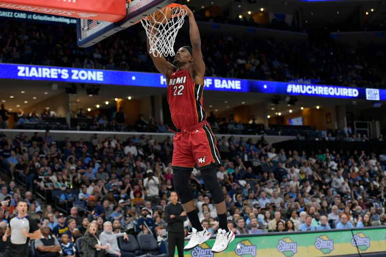 Jimmy Butler dunks the ball.