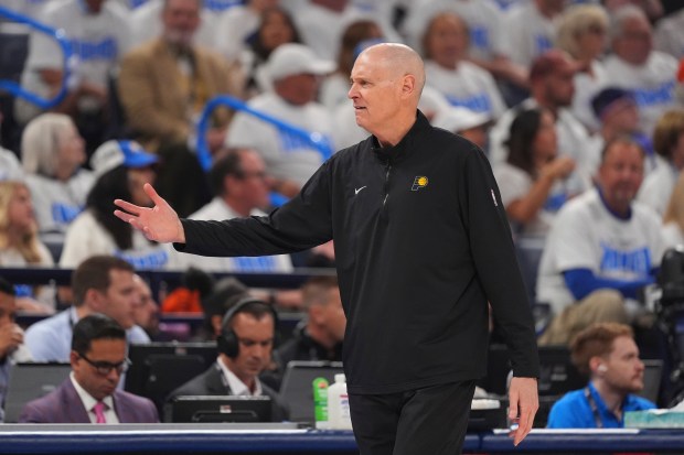 Indiana Pacers head coach Rick Carlisle walks on the sideline...