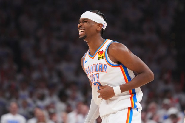 Oklahoma City Thunder guard Shai Gilgeous-Alexander (2) reacts after a...