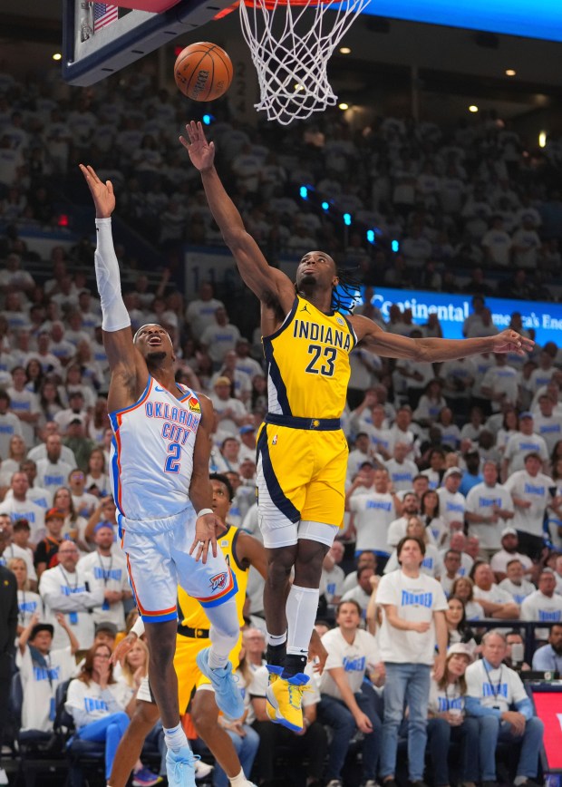Oklahoma City Thunder guard Shai Gilgeous-Alexander (2) shoots against Indiana...
