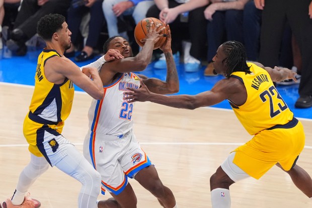Indiana Pacers guard Tyrese Haliburton, left, and forward Aaron Nesmith...