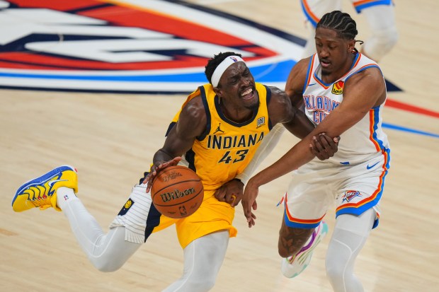 Oklahoma City Thunder forward Jalen Williams (8) fouls Indiana Pacers...