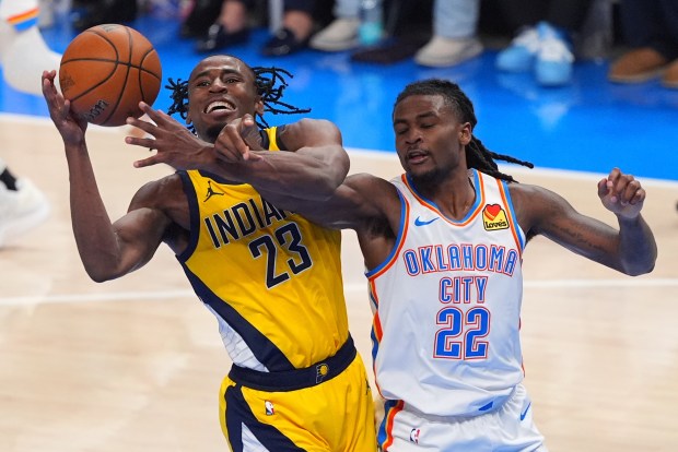 Oklahoma City Thunder guard Cason Wallace (22) defends against Indiana...