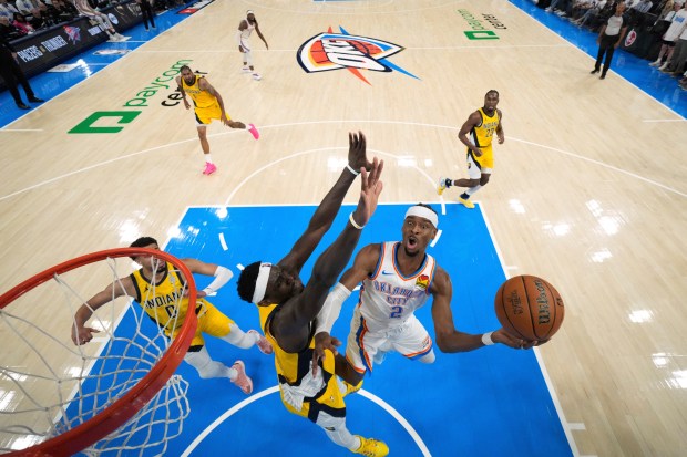 Oklahoma City Thunder guard Shai Gilgeous-Alexander (2) shoots against Indiana...