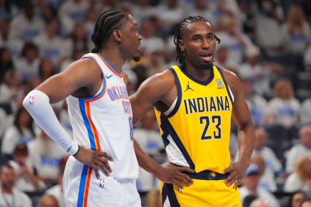 Oklahoma City Thunder forward Jalen Williams (8) talks with Indiana...