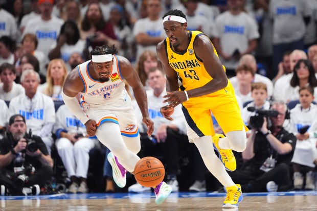 Oklahoma City Thunder guard Luguentz Dort (5) and Indiana Pacers...