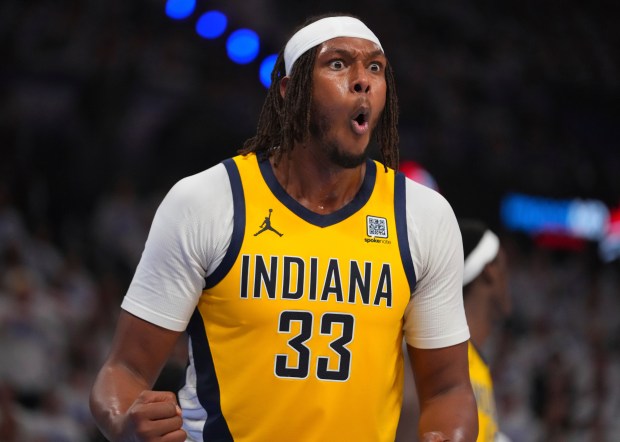 Indiana Pacers center Myles Turner (33) reacts after a double...