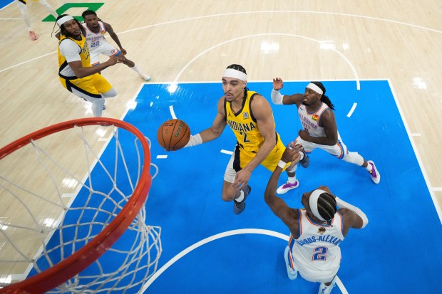 Indiana Pacers guard Andrew Nembhard (2) shoots the ball against...