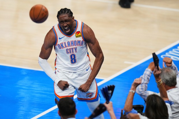 Oklahoma City Thunder forward Jalen Williams (8) celebrates after a...