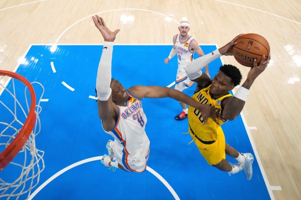 Indiana Pacers guard Bennedict Mathurin (00) shoots against Oklahoma City...