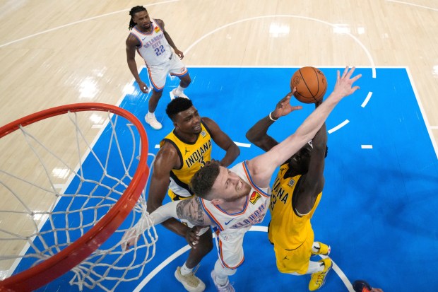Oklahoma City Thunder center Isaiah Hartenstein (55) knocks the ball...