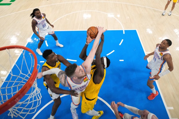 Oklahoma City Thunder center Isaiah Hartenstein (55) knocks the ball...
