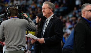 San Antonio Spurs television play-by-play announcer Bill Land in the first half of an NBA basketball game Tuesday, April 2, 2024, in Denver. (AP Photo/David Zalubowski)