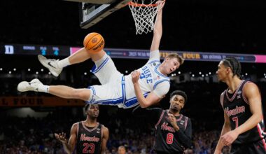 Duke's Cooper Flagg (2) looks back after dunking the ball as Houston's Terrance Arceneaux (23), Mylik Wilson (8) and Milos Uzan (7) watch during the first half in the national semifinals at the Final Four of the NCAA college basketball tournament, Saturday, April 5, 2025, in San Antonio. (AP Photo/Eric Gay, File)