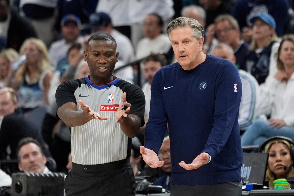 Minnesota Timberwolves head coach Chris Finch, right, gestures next to referee James Williams during the second half of Game 4 of the Western Conference finals of the NBA basketball playoffs between the Timberwolves and the Oklahoma City Thunder Monday, May 26, 2025, in Minneapolis.