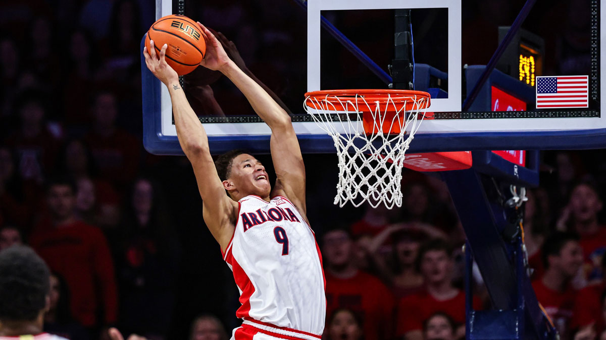 Arizona Wildcats forward Carter Bryant (9) dunks the ball during the first half against the Arizona State Sun Devils at McKale Center.