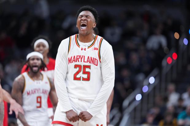 Maryland's Derik Queen reacts to a basket against Michigan during the second half on March 15, 2025. (AP Photo/Michael Conroy)